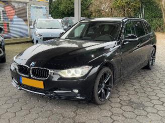 Damaged car BMW 3-serie 320 i. F31. Station 2013/6