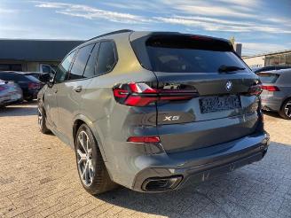 Schadeauto BMW X5 xDrive50e M Sport Pro * HUD - KAM - H&K * 2024/7