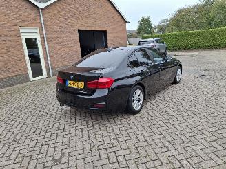 Schadeauto BMW 3-serie 318i  100kw clima  ececutieve 2018/2