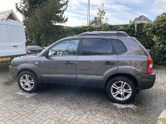Schadeauto Hyundai Tucson 2.0i Dynamic version Van/Grijs kenteken 2009/11