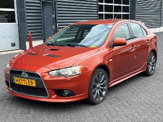 uszkodzony samochody osobowe Mitsubishi Lancer EVOLUTION 2.0 Turbo 16V Ralliart 4x4 Hatchback  Benzine 1.997cc 177kW (241pk) 4x4 2010/3
