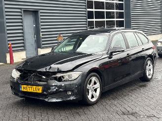 damaged passenger cars BMW 3-serie 320d 2.0 16V Combi/o  Diesel 1.995cc 135kW (184pk) RWD 2014/6