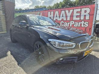 Schadeauto BMW 1-serie 118i centennial high executive 2016/2