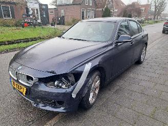 Damaged car BMW 3-serie 320i high executive automaat 2012/5