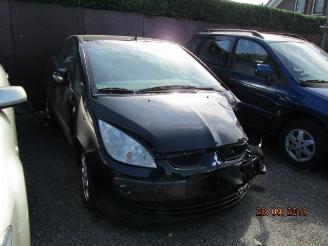 uszkodzony samochody osobowe Mitsubishi Colt 1.5 cabrio 2006/10