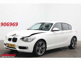damaged passenger cars BMW 1-serie 116i 5-DRS Navi Bluetooth Airco PDC SHZ 2014/9