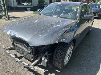 Schadeauto BMW 3-serie 320e Touring xDrive Business Automaat 2021/11