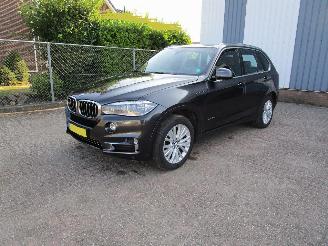 damaged passenger cars BMW X5 4.0 Hybride AWD Leder Navi 2015/12