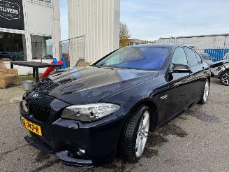 Damaged car BMW 5-serie 520i High Executive AUTOMAAT 2015/6