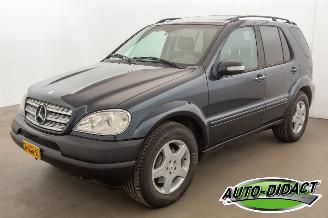 Damaged car Mercedes M-klasse 55 AMG Automaat Airco Elek dak Leder 2002/4