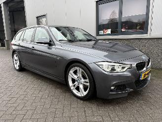Vaurioauto  passenger cars BMW 3-serie 320i M sport Touring Automaat 2016/2