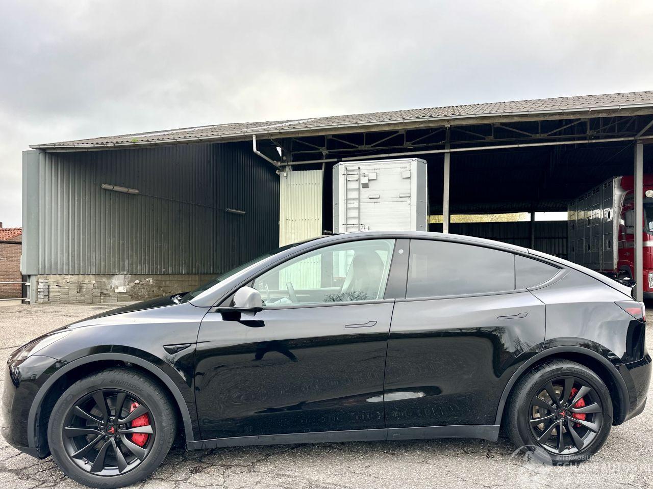 Tesla Model Y Gereserveerd long range 75kwh aut - pano - leer - carbon - 360cam - stoelverw v+a - multimedia achter