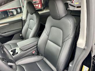 Tesla Model Y Gereserveerd long range 75kwh aut - pano - leer - carbon - 360cam - stoelverw v+a - multimedia achter picture 17