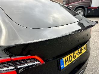 Tesla Model Y Gereserveerd long range 75kwh aut - pano - leer - carbon - 360cam - stoelverw v+a - multimedia achter picture 93