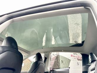 Tesla Model Y Gereserveerd long range 75kwh aut - pano - leer - carbon - 360cam - stoelverw v+a - multimedia achter picture 55