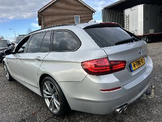 BMW 5-serie Touring 520i 184pk 8-traps aut Luxury Ed - nap - leer - stoelverw - elektr trekh + stuur - memory l+r picture 7