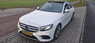 Schadeauto Mercedes E-klasse E200 Aut. AMG-LINE  AmbientLight  HalfLeer Navi Pano/SchuifDak StoelVerwarming NL-AUTO Schadevrij 2016/7