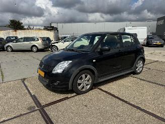 uszkodzony samochody osobowe Suzuki Swift 1.3 Comfort 2009/5