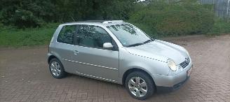 Vaurioauto  passenger cars Volkswagen Lupo Cambridge Edition 1.4-Mpi 1e eigenaar (1945) Elektrische ramen Schuifdak centrale vergrendeling Leren stuurwiel 14 inch Cambridge velgen 2003/2